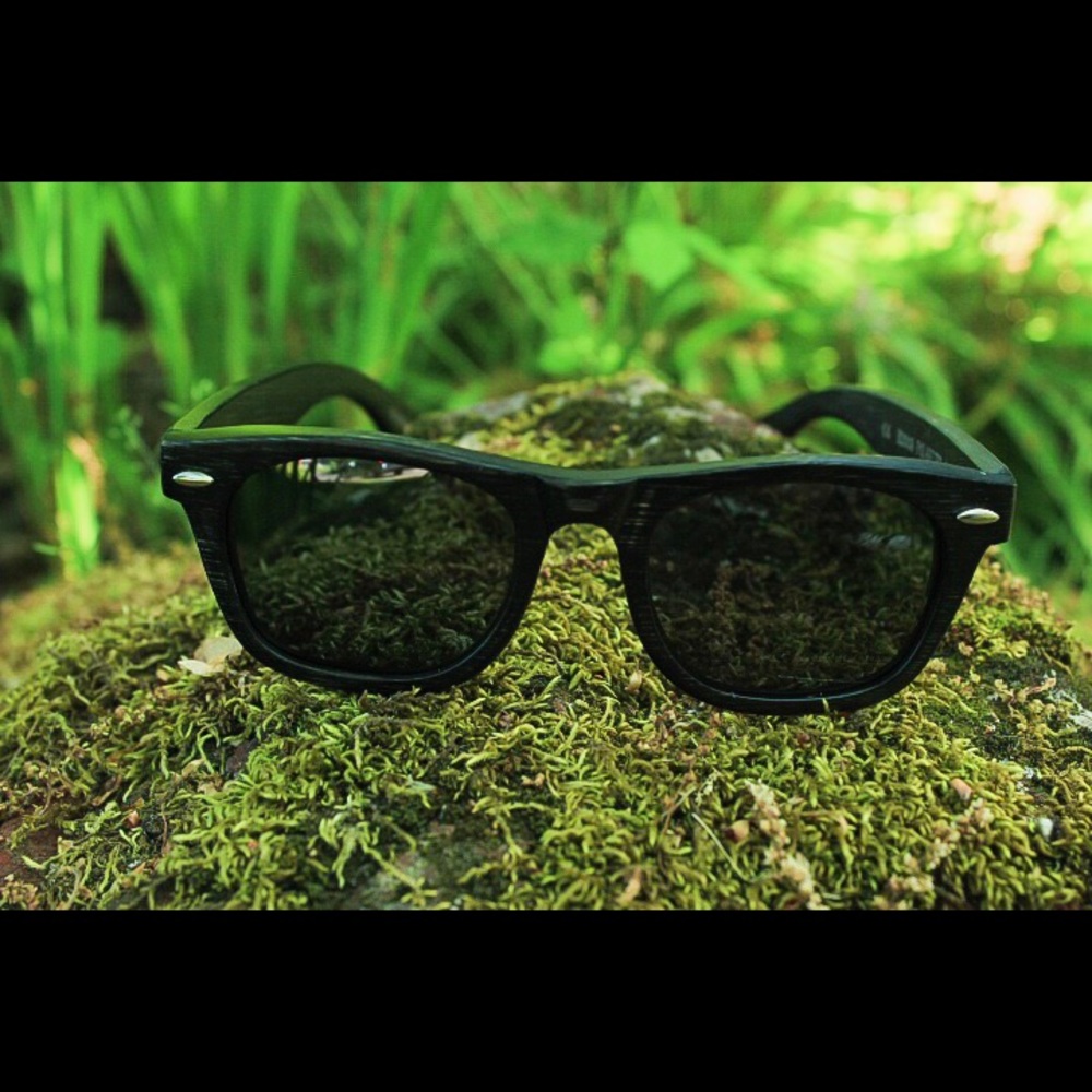 Handmade bamboo sunglasses with UV400 lenses.